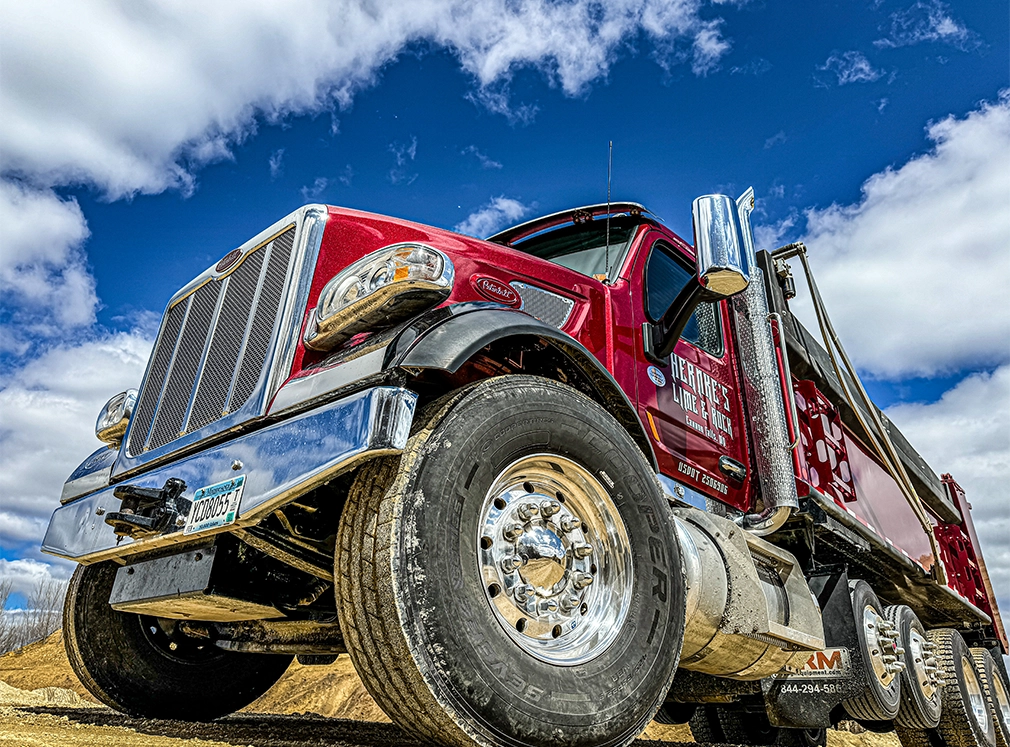 323-custom-hauling red dump truck